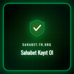 Sahabet kayıt ol ekranını gösteren bir dizüstü bilgisayar ve kahve fincanı